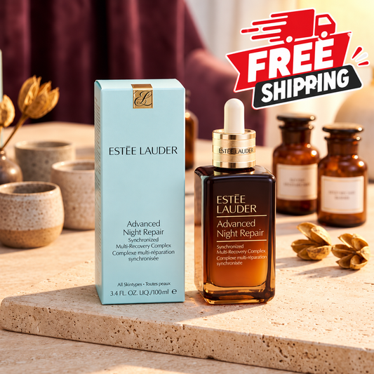Estée Lauder Advanced Night Repair serum shown with its light blue box and amber dropper bottle on a stone surface, with Estée Lauder bottles and a 'FREE SHIPPING' graphic in the background.
