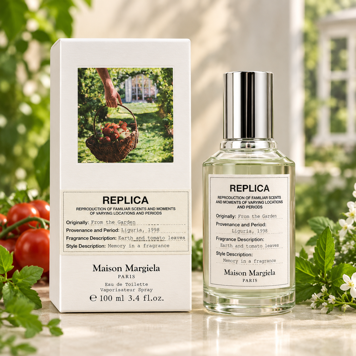 Maison Margiela Replica Eau de Toilette bottle and its original white packaging box, styled on a marble surface with green leaves and white flowers in the background.